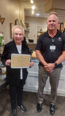 Eileen Nelson with Chris Brabant - Eileen is holding a volunteer of year certificate